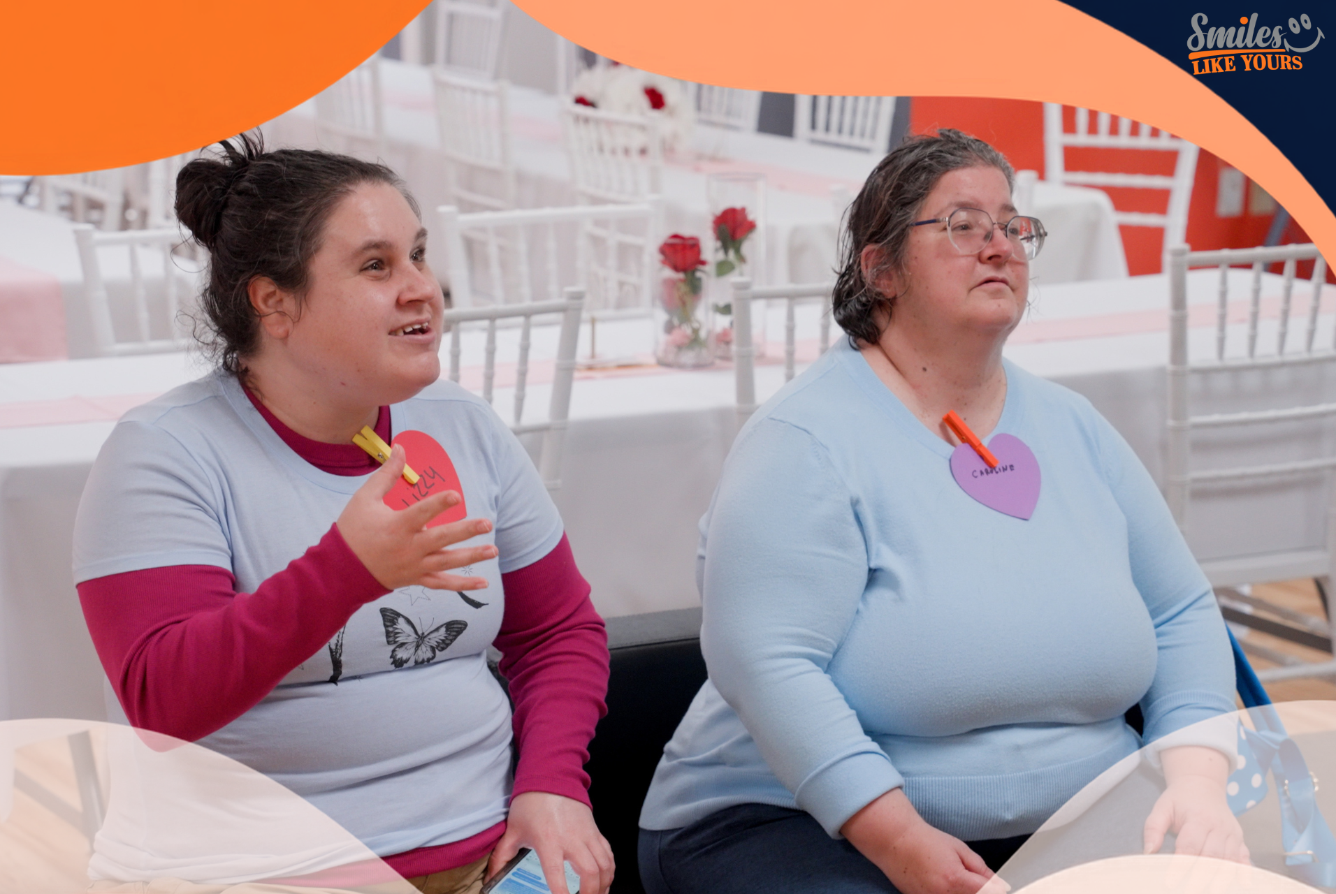 Two women talking during an inclusive Smiles Like Yours community event in Virginia.